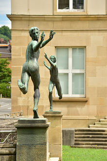 Skulptur L&auml;ufer (zwei Menschen aus Bronze)