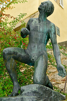 Skulptur H&ouml;lderlin (kniender Mann aus Bronze)